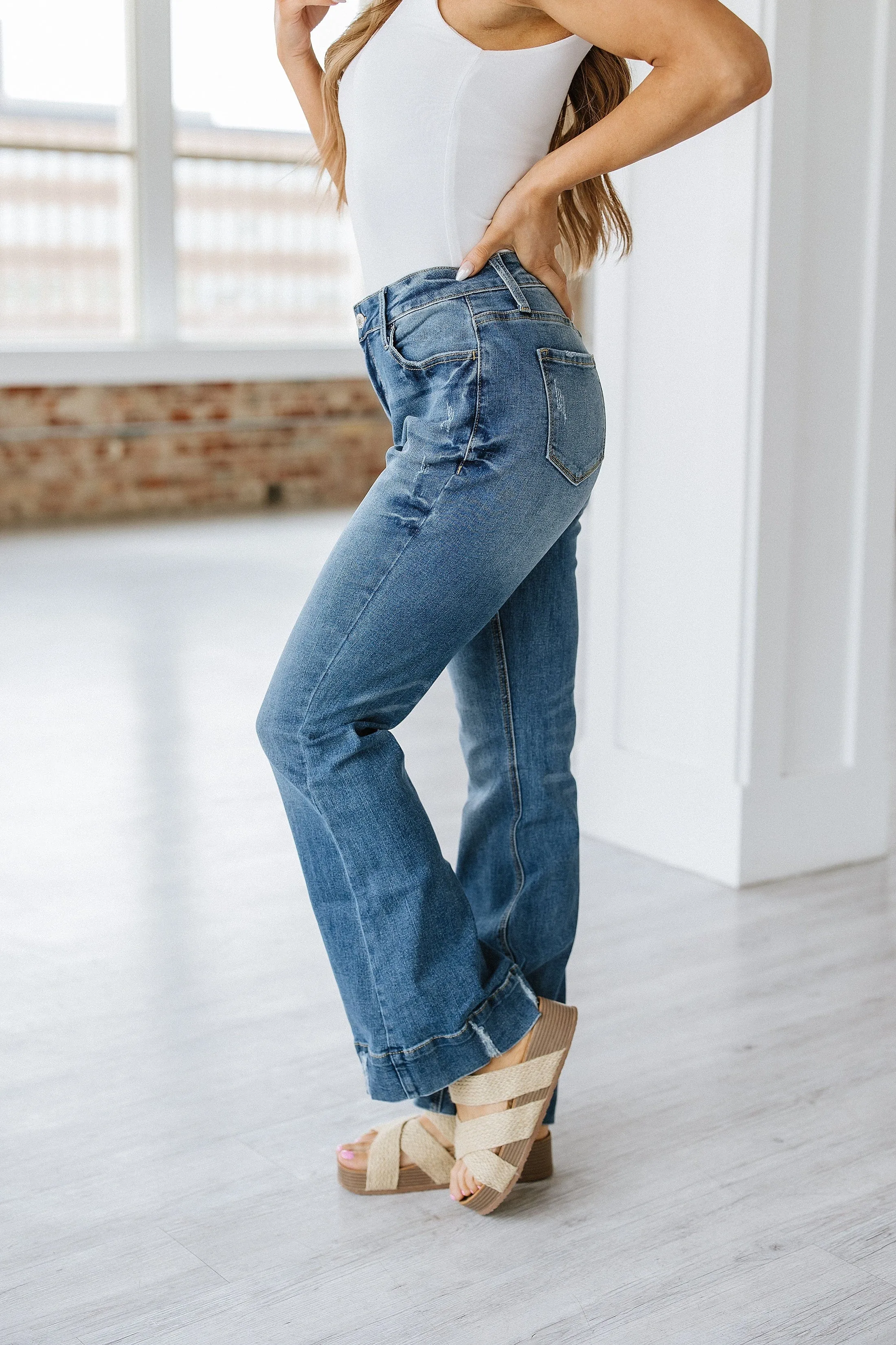 Conrad Distressed Washed Flare Jean