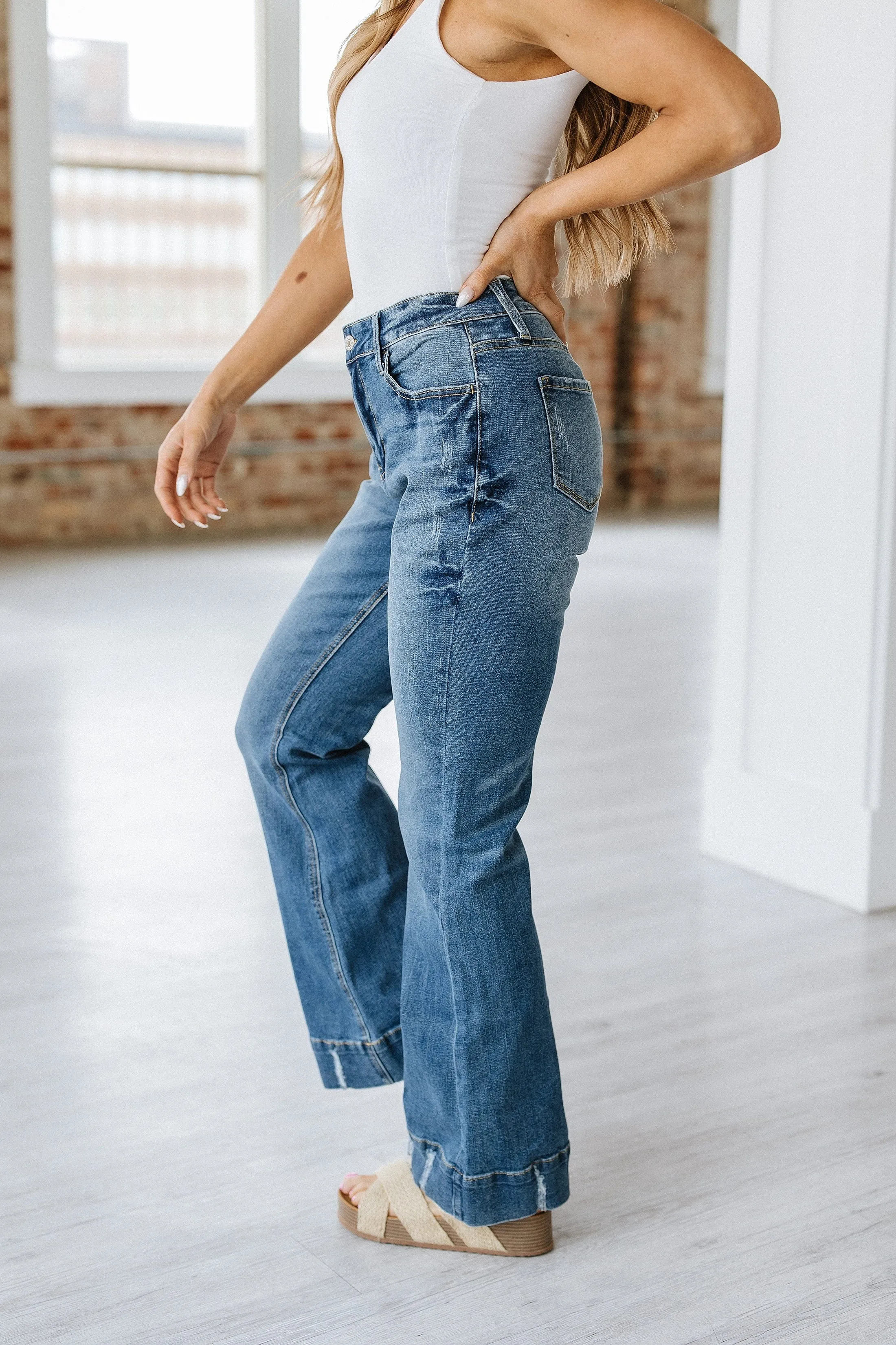Conrad Distressed Washed Flare Jean